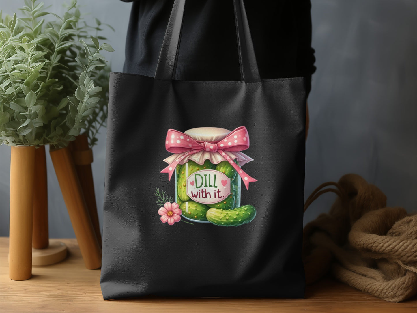 Black tote bag with a dill pickle jar and quote "Dill with it."