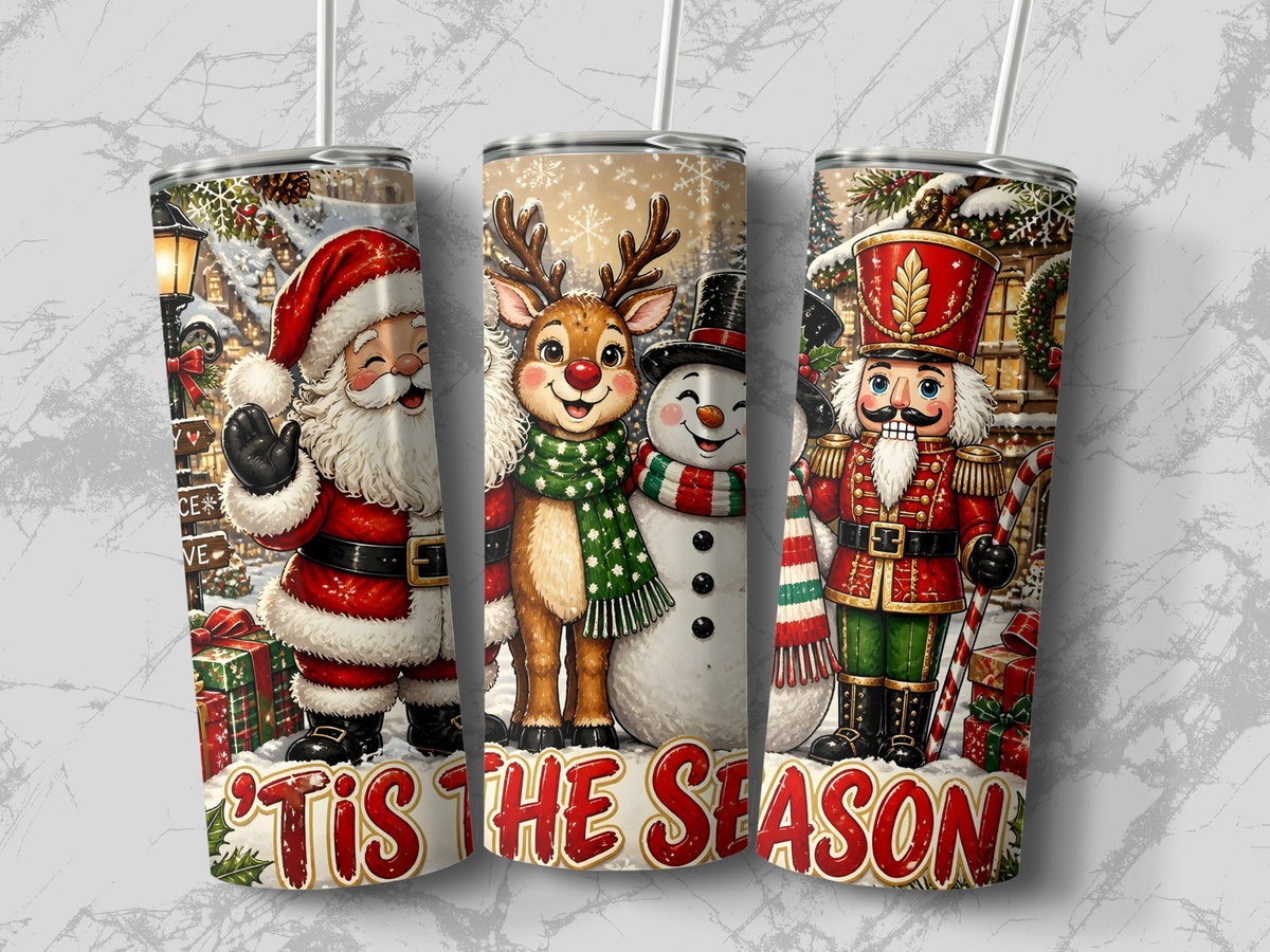 Three metal tumblers with straws feature a Christmas design showing Santa Claus, a reindeer, a snowman, and a nutcracker.