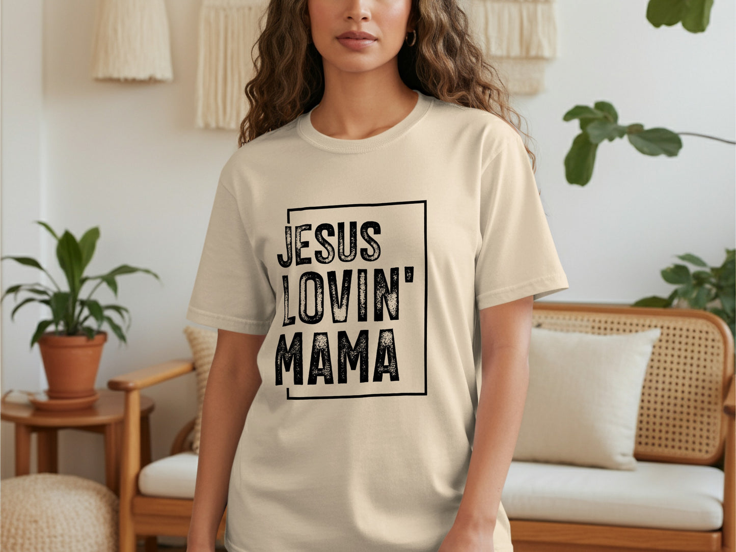 T-shirt with "JESUS LOVIN' MAMA" text in a square frame.