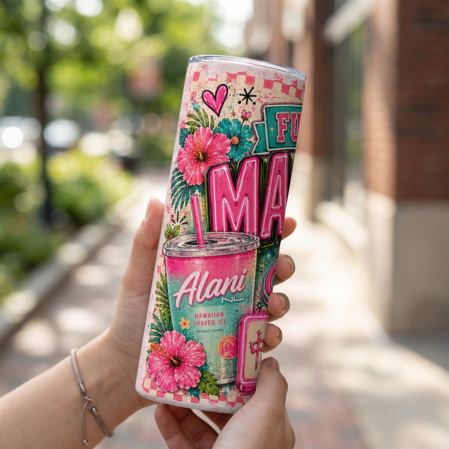 Tumbler with Alani Nu logo, hibiscus flowers, and "Fiji Mama" text.