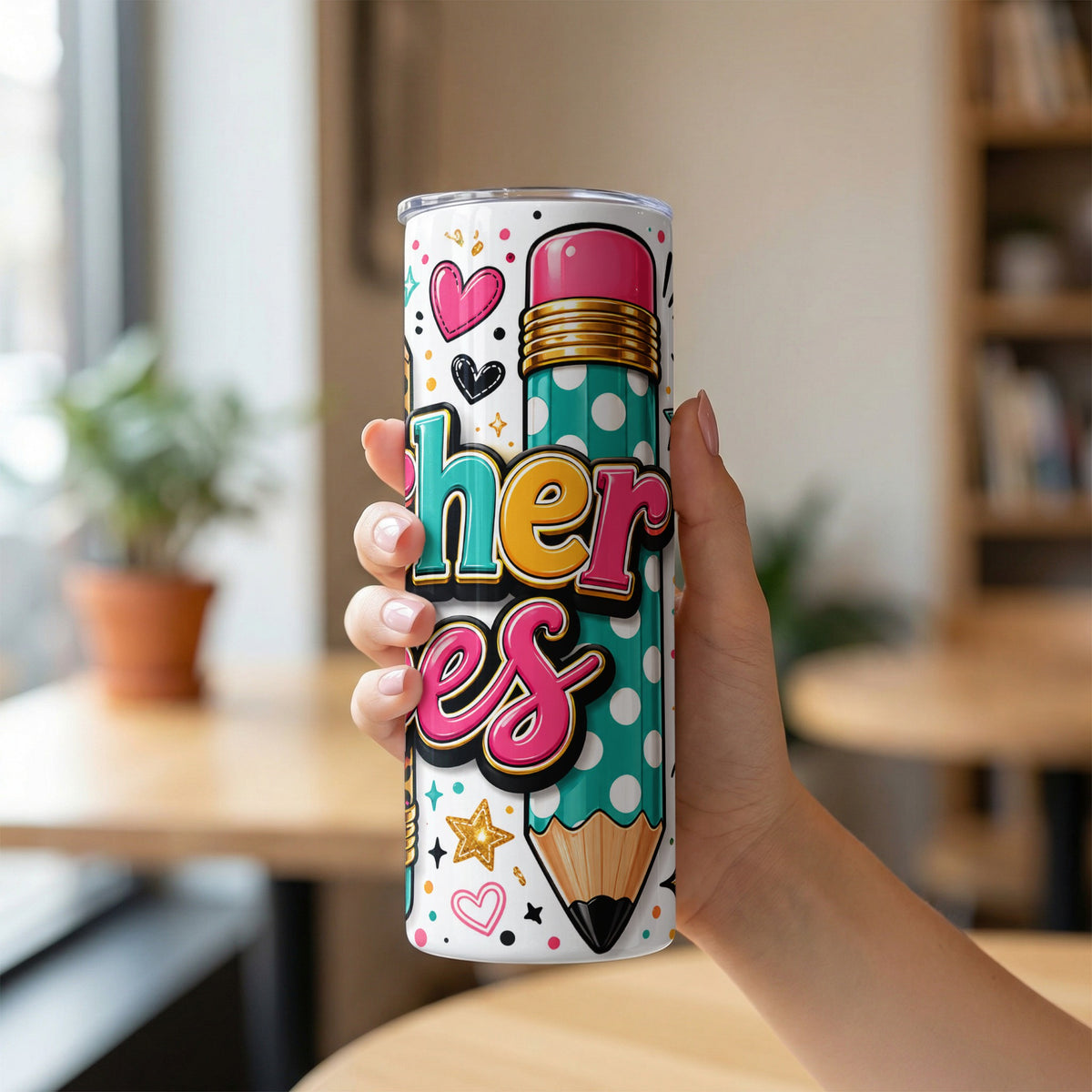 Tumbler with "her eff" text, pencil graphic, hearts, and polka dots.
