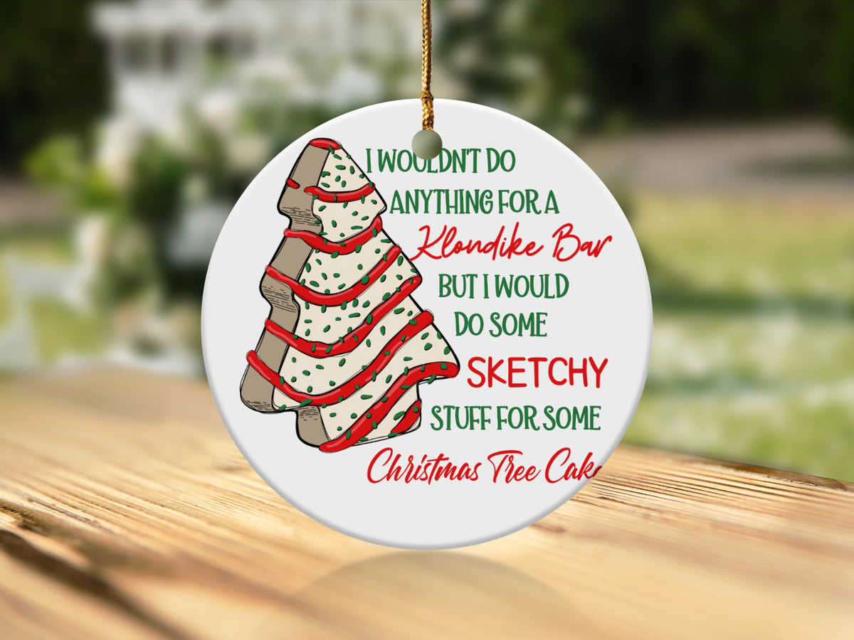 Round ornament with Christmas tree cake design and text about Klondike Bars.