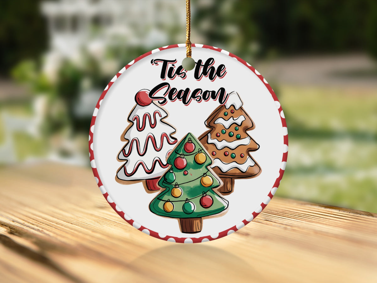 Round ornament with three decorated Christmas trees and "Tis the Season" text.