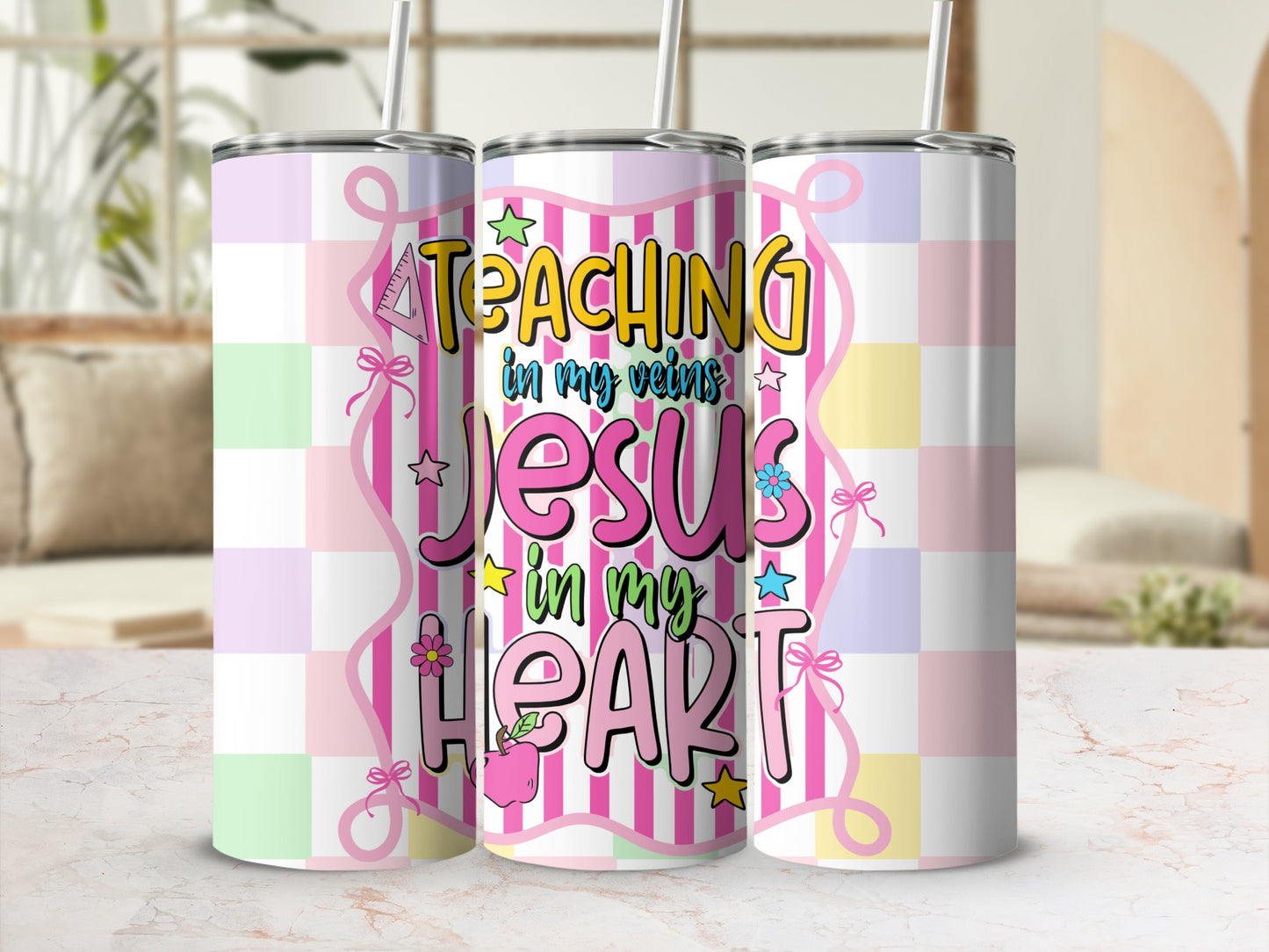 "Teaching in my veins Jesus in my heart" graphic on three tumblers.