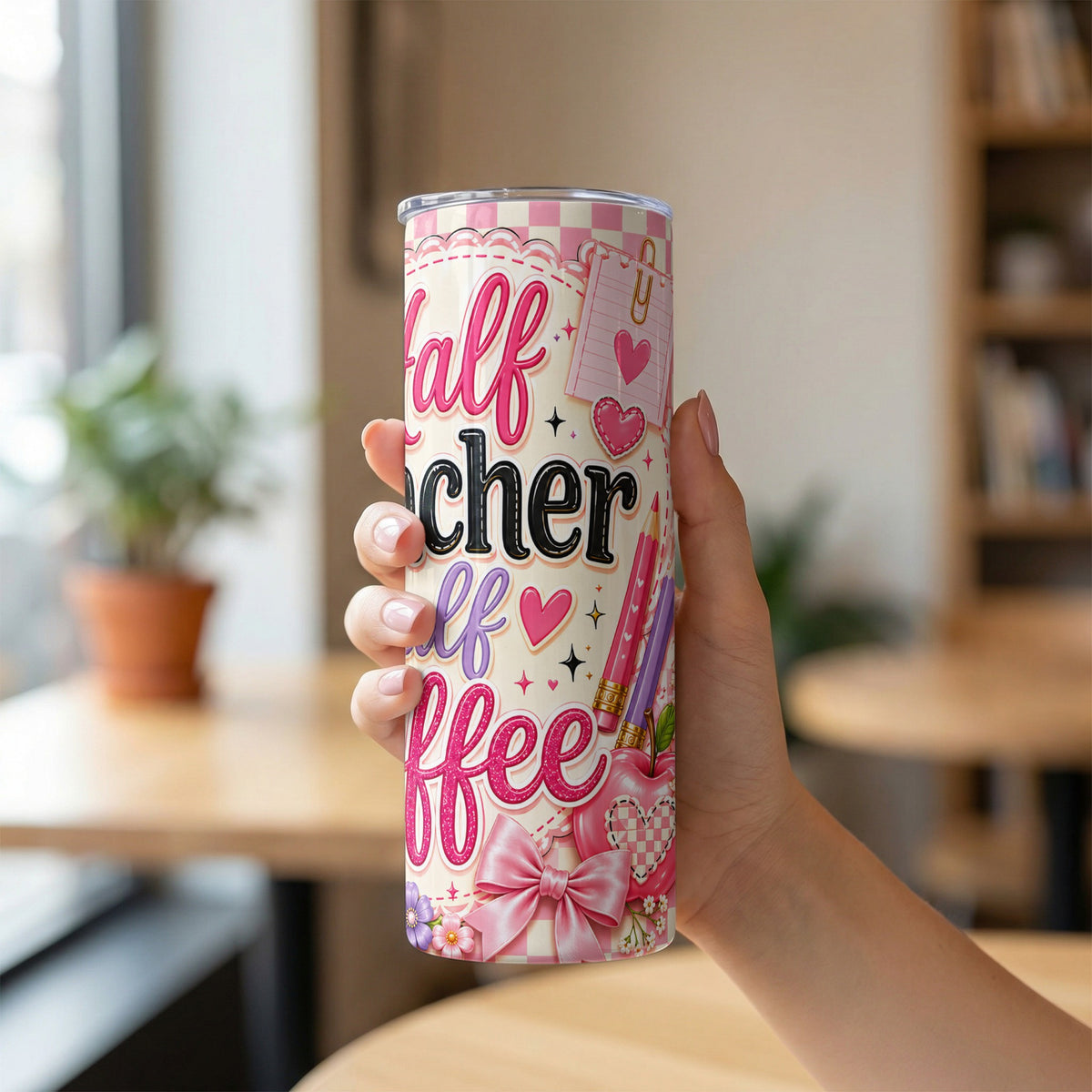 Multicolor tumbler with "Half Teacher, Half Coffee" text and school/coffee themed graphics.