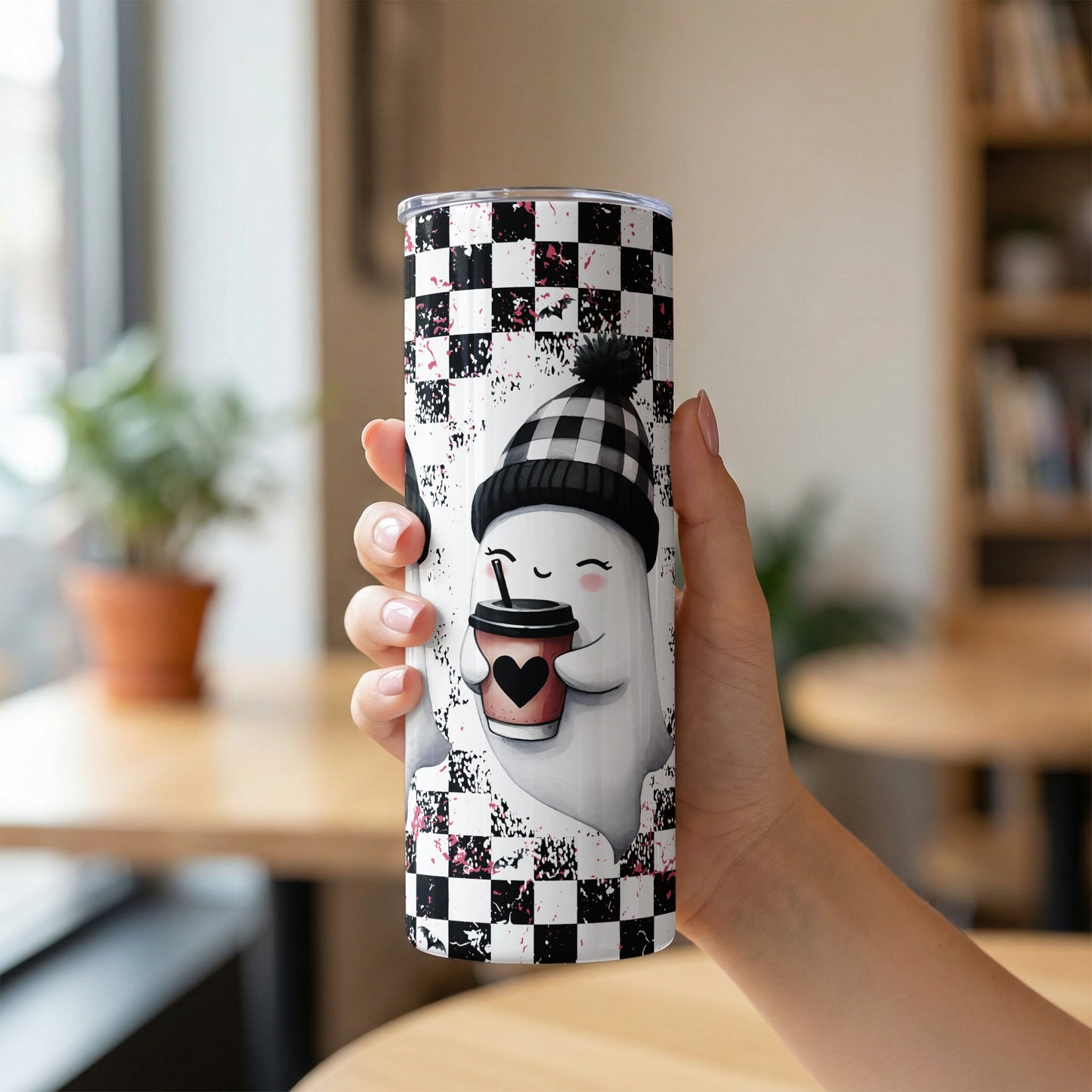 Tumbler with a cute ghost wearing a beanie and holding a coffee cup.