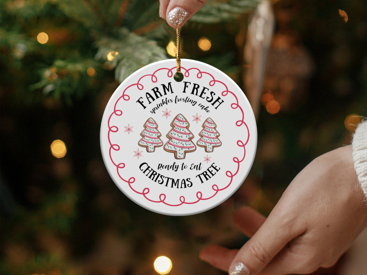 Round ceramic ornament with "Farm Fresh" and Christmas tree cookies.
