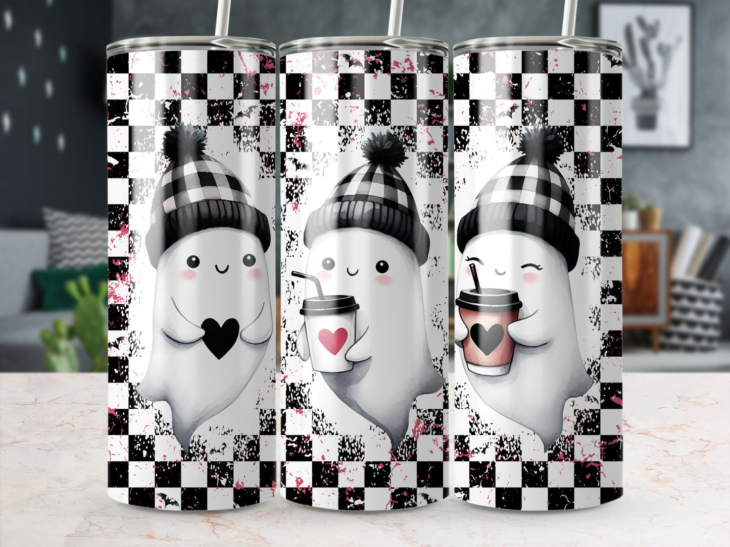 Three tumblers featuring cute ghosts in buffalo plaid hats on a checkered background.