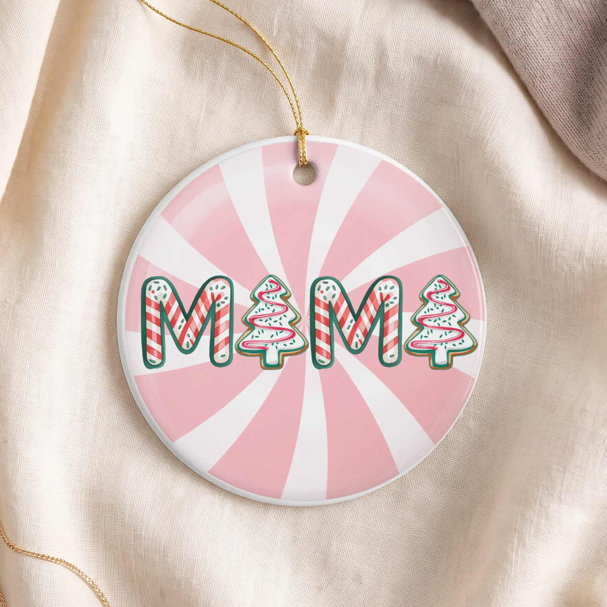 Round ceramic ornament with "MAMA" text in candy cane and Christmas tree designs.