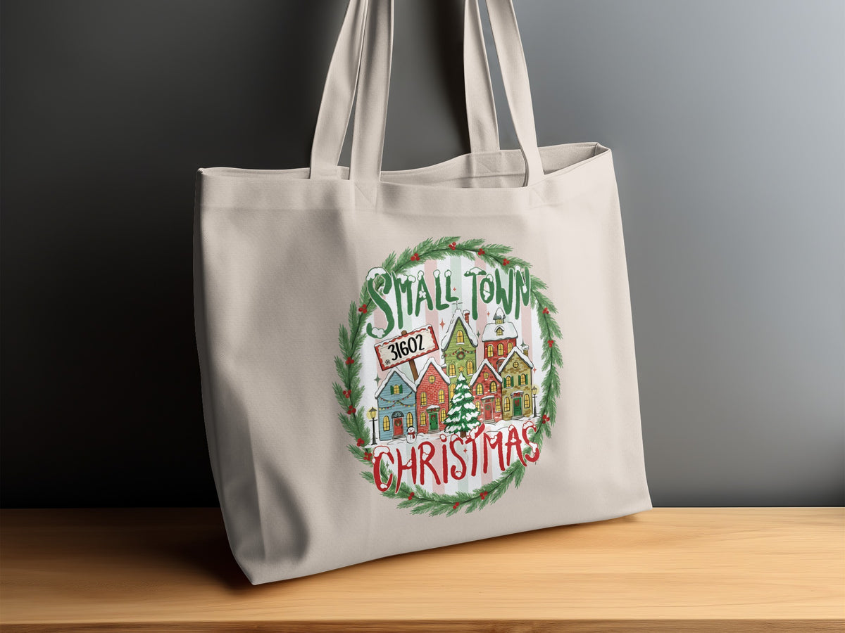 Tote bag with a Christmas village design and "Small Town Christmas" text.