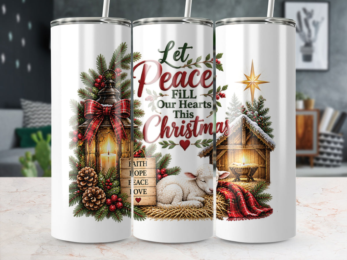 Three white cylindrical tumblers displaying a Christmas design featuring a lantern, a sleeping lamb, and a nativity scene with the text Let Peace Fill Our Hearts This Christmas.