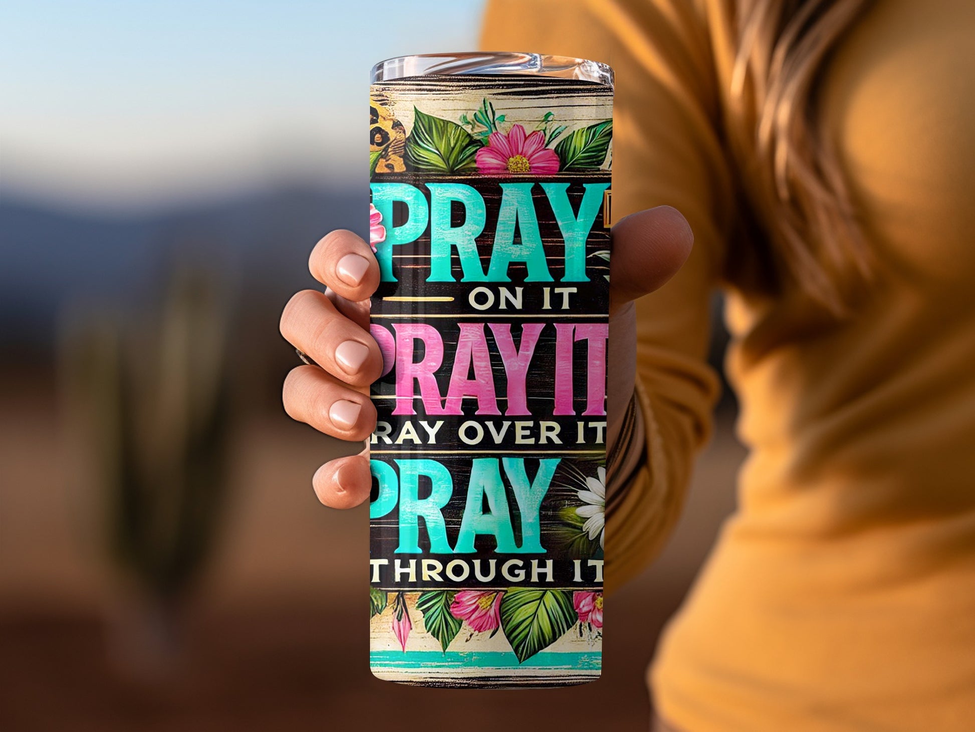 Tumbler with "PRAY ON IT, PRAY OVER IT, PRAY THROUGH IT" text and floral design.