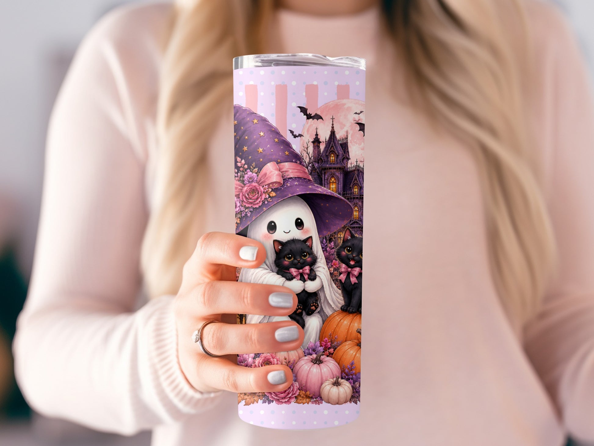 Halloween tumbler with ghost, black cats, pumpkins, and haunted house.
