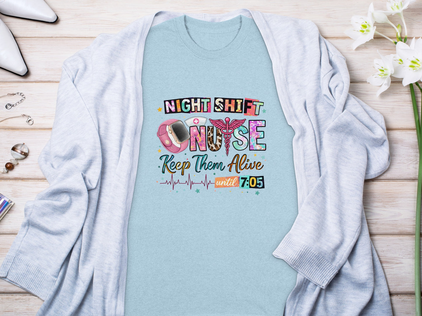 T-shirt with "Night Shift Nurse" text, stethoscope, and heart monitor design.