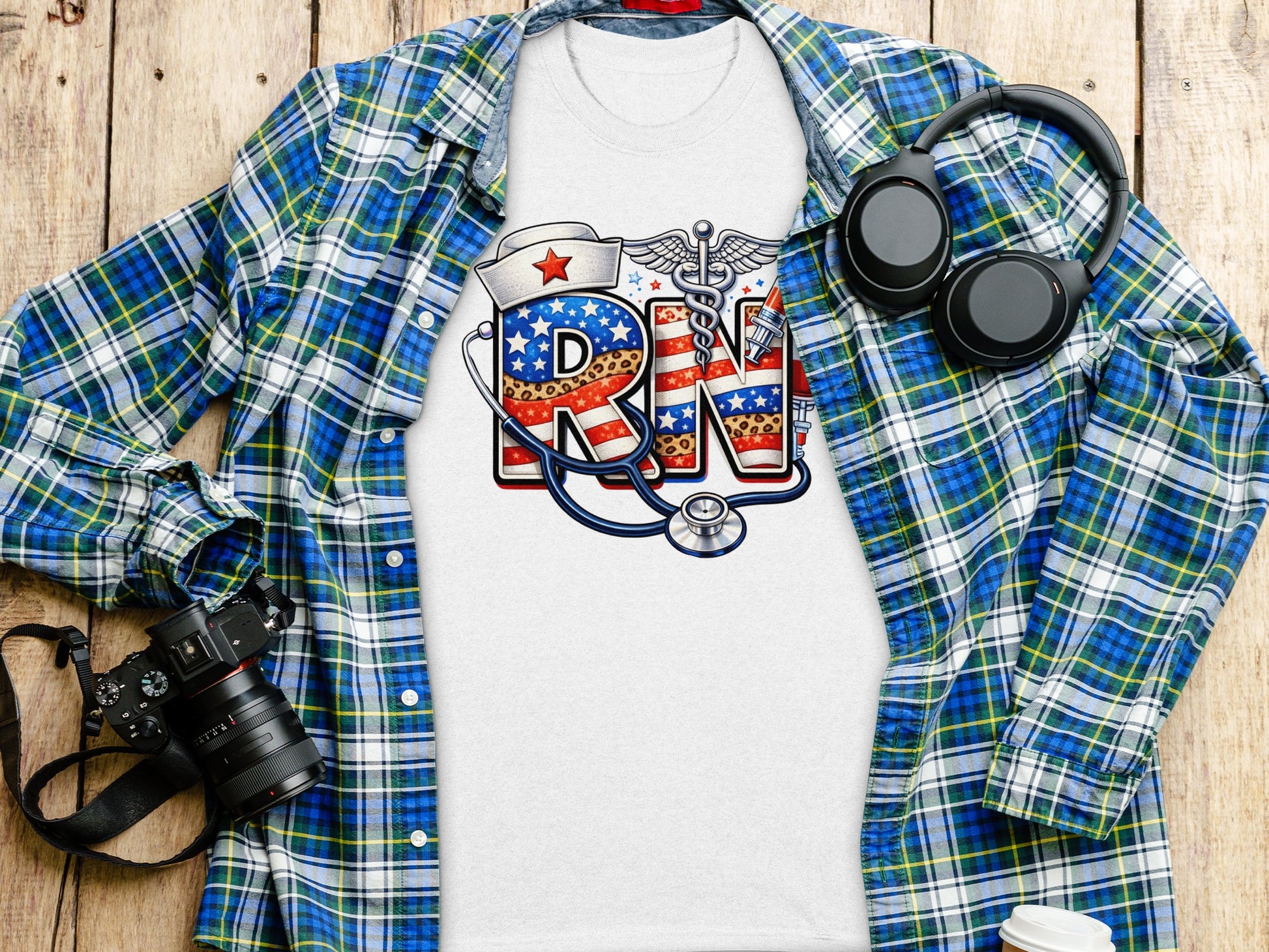 T-shirt with stars and stripes RN lettering, stethoscope, and caduceus.