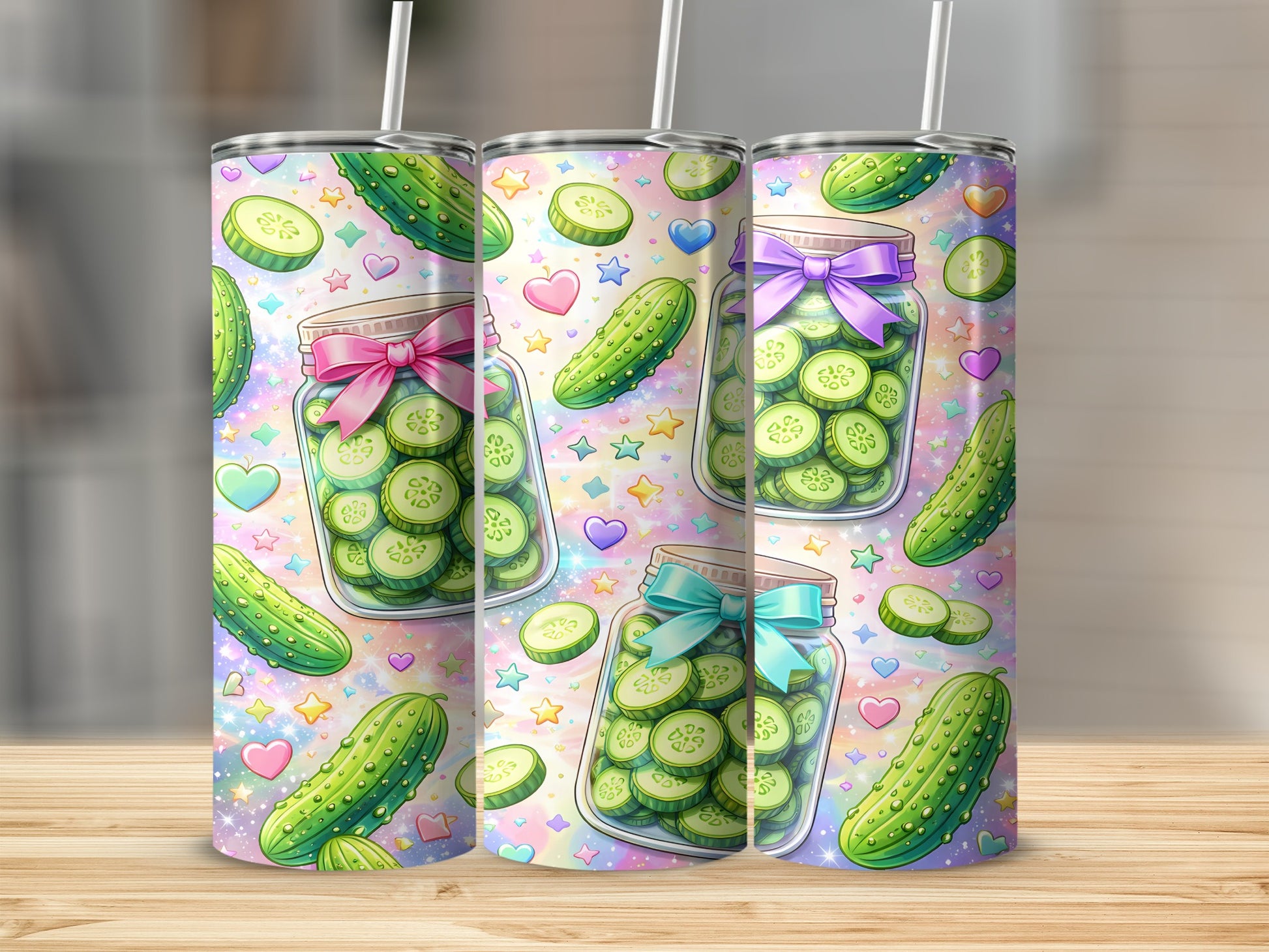 Three tall tumblers with a dill pickle and heart pattern.