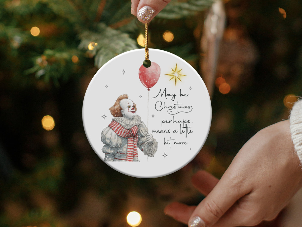 Round ornament featuring a clown and text that reads "May be Christmas, perhaps, means a little bit more."