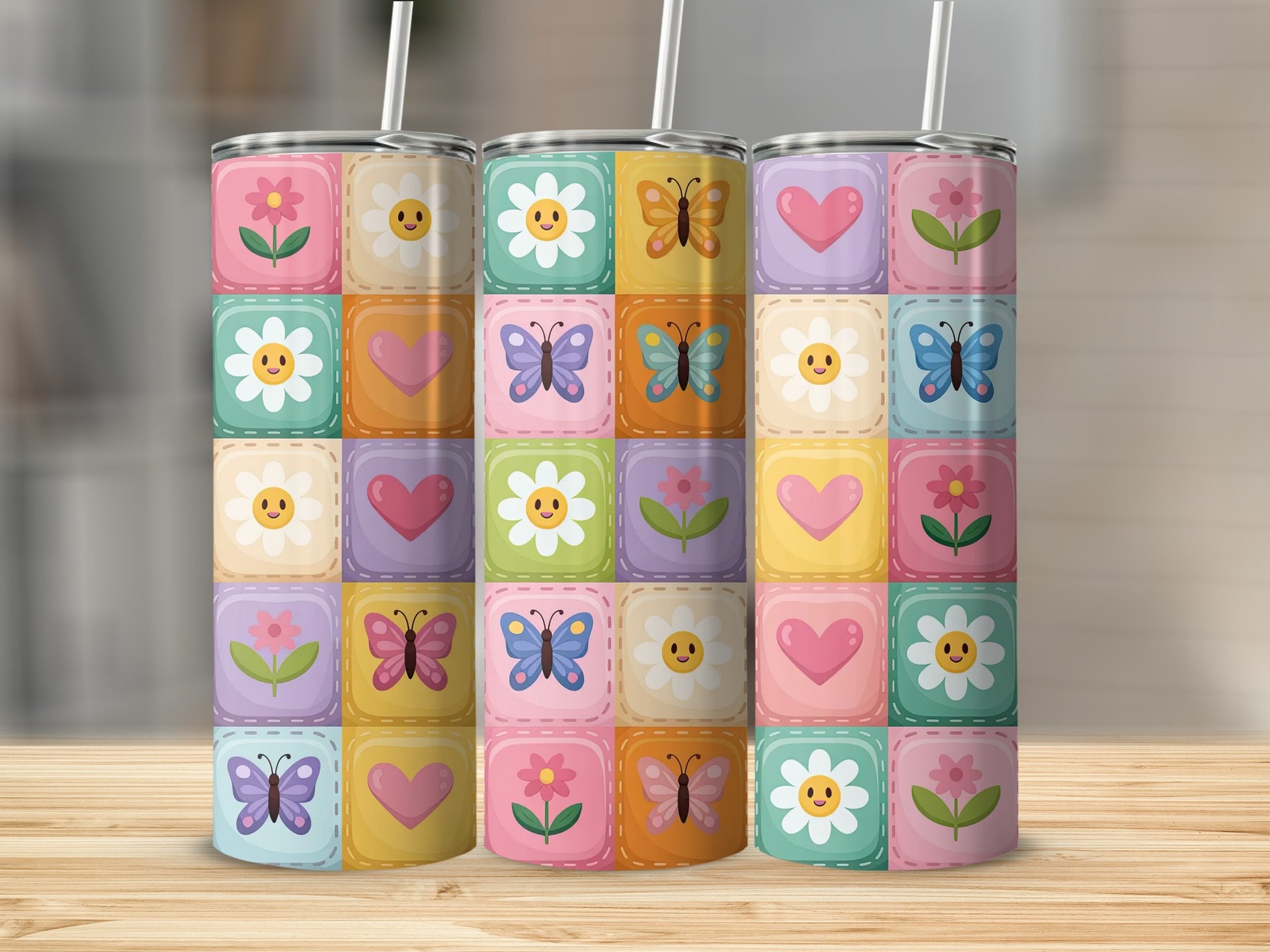 Quilted pattern of flowers, hearts, and butterflies on a tumbler.
