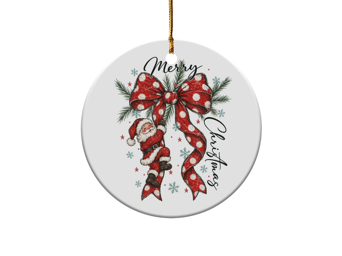Round ornament with Santa, red polka dot bow, pine sprigs, and "Merry Christmas" text.