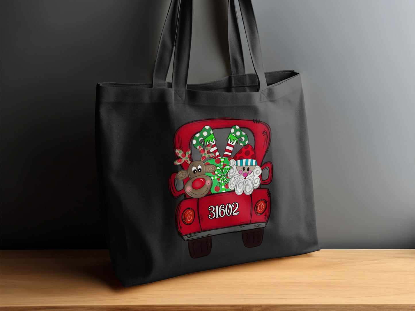 Black tote bag with Christmas truck design featuring Santa, reindeer, and gifts, displaying "31602".