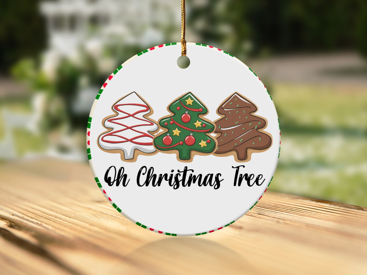 Round ornament with three Christmas tree cookies and "Oh Christmas Tree" text.