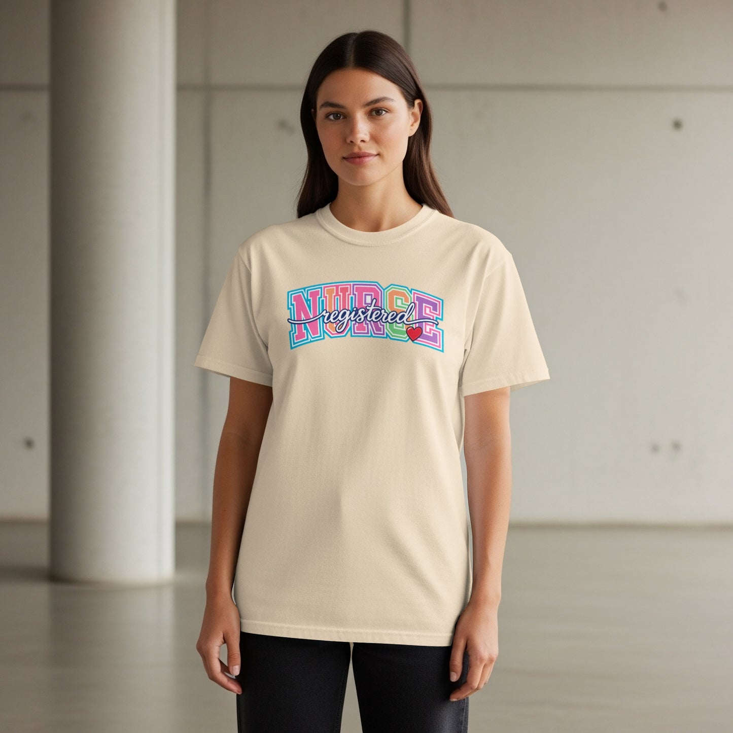 Cream t-shirt with "Registered Nurse" text in colorful block letters and a heart.