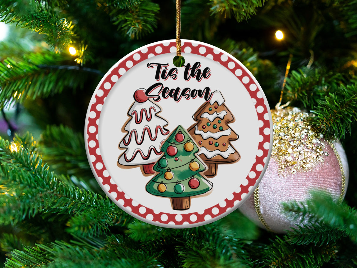 "Tis the Season" Christmas ornament with gingerbread trees on a decorated Christmas tree.