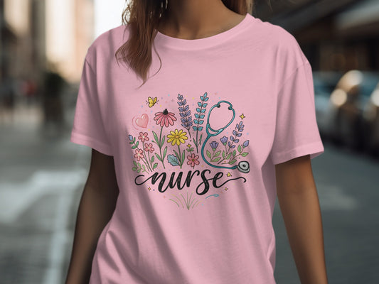 Pink t-shirt with stethoscope and floral "nurse" design.