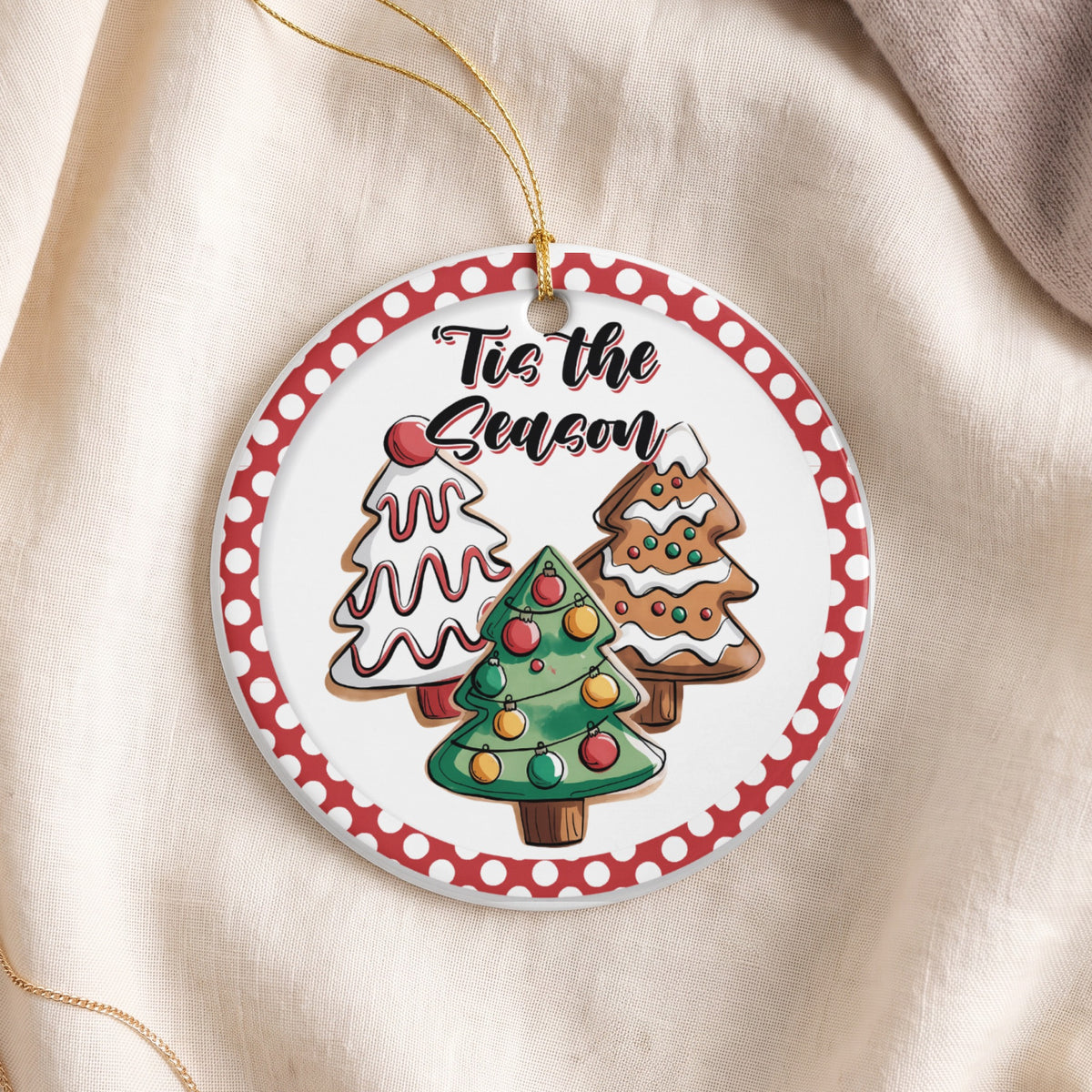 Ornament with three decorative trees and "Tis the Season" text on a polka dot border.