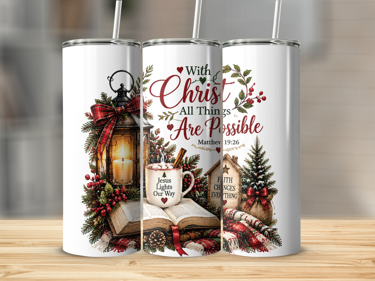 Three matching skinny tumblers with straws feature a Christmas design showing a lantern, open book, and Christian text.