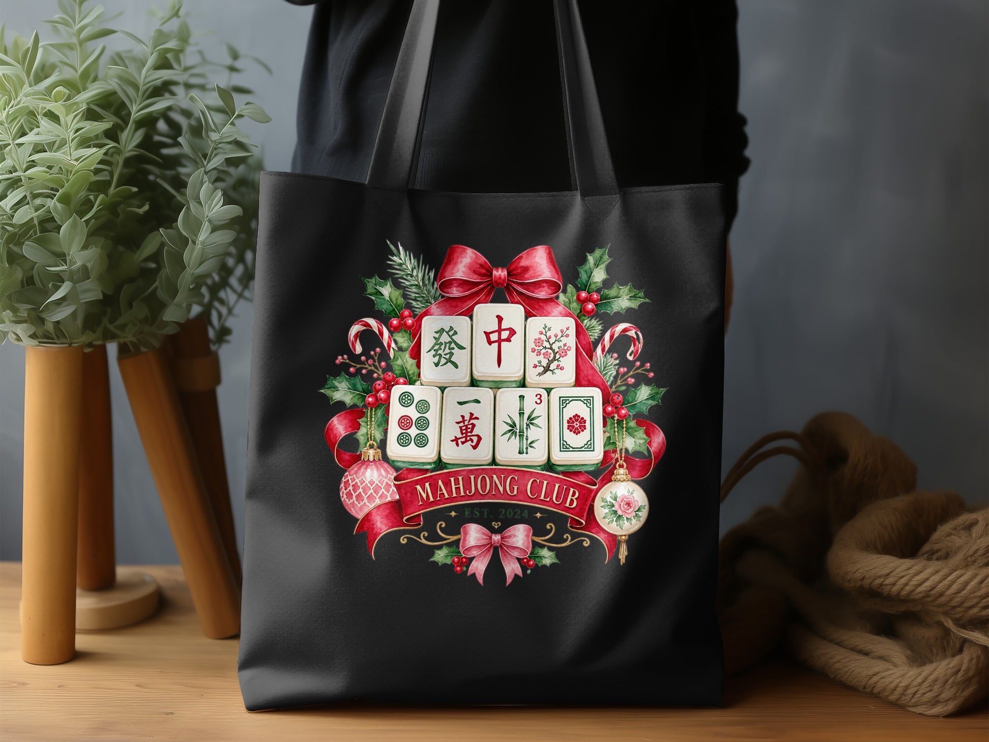 Black tote bag with a Mahjong Club Christmas design.