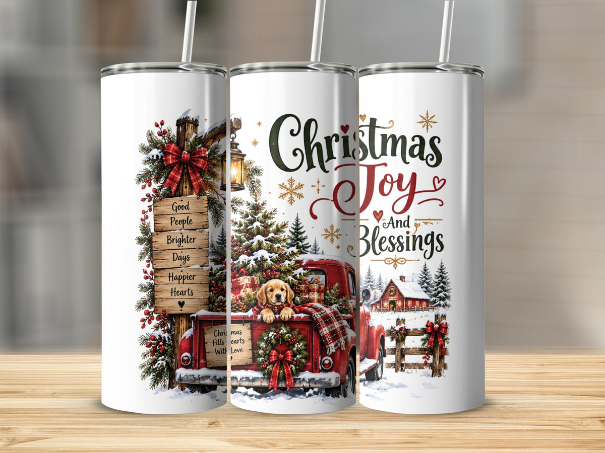 Three views of a stainless steel tumbler featuring a Christmas watercolor design with a red truck and puppy.