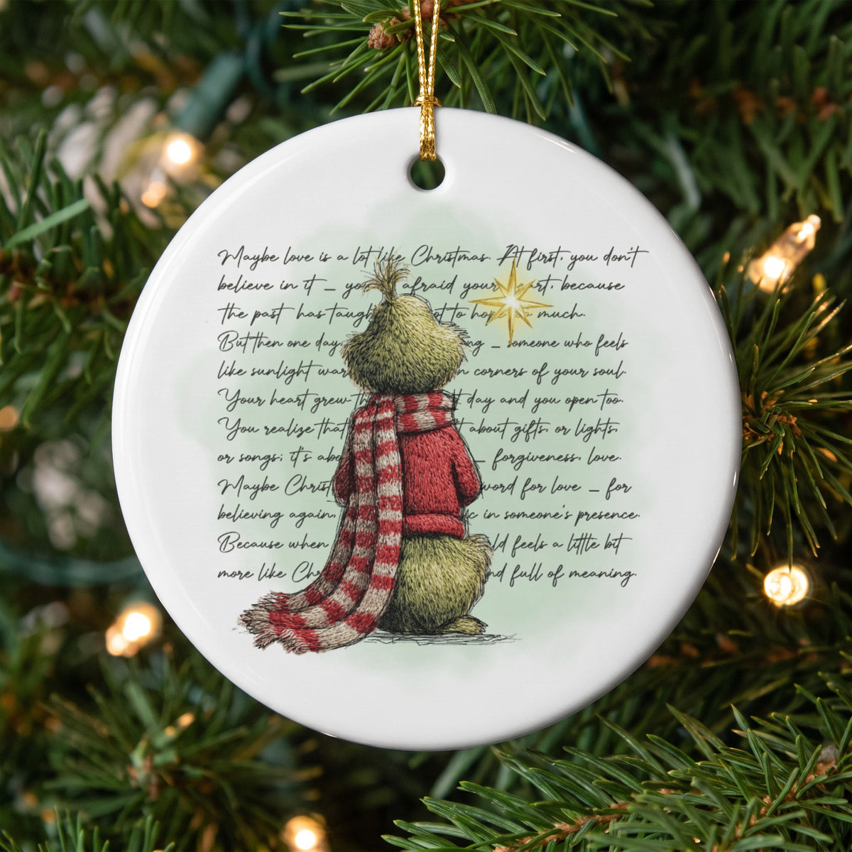 Ornament featuring the Grinch and quote about love and Christmas.
