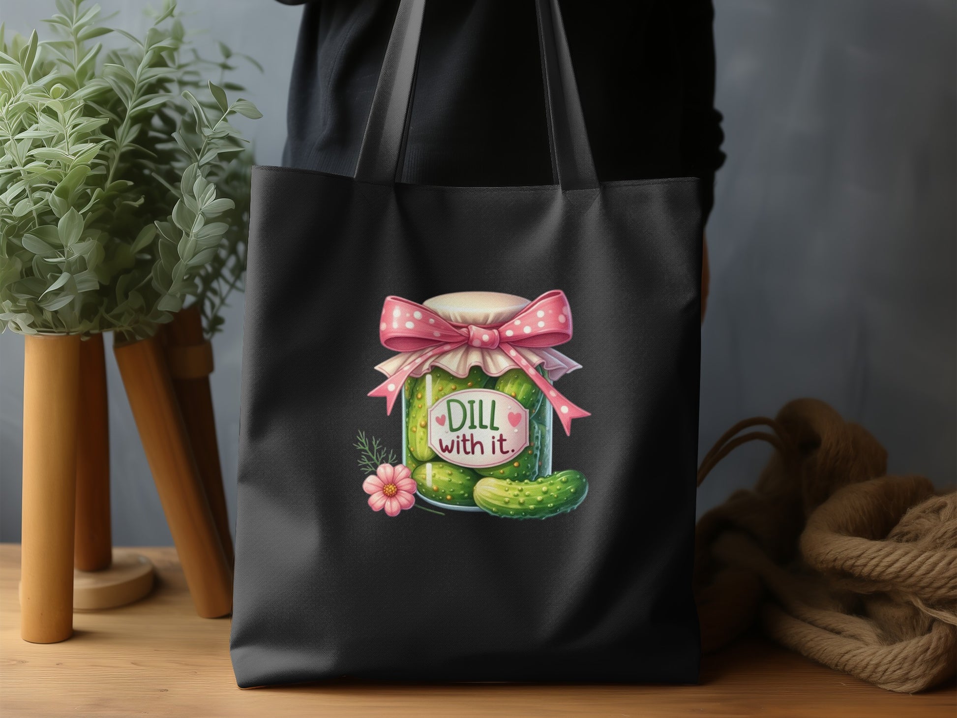 Black tote bag with a dill pickle jar and quote "Dill with it."