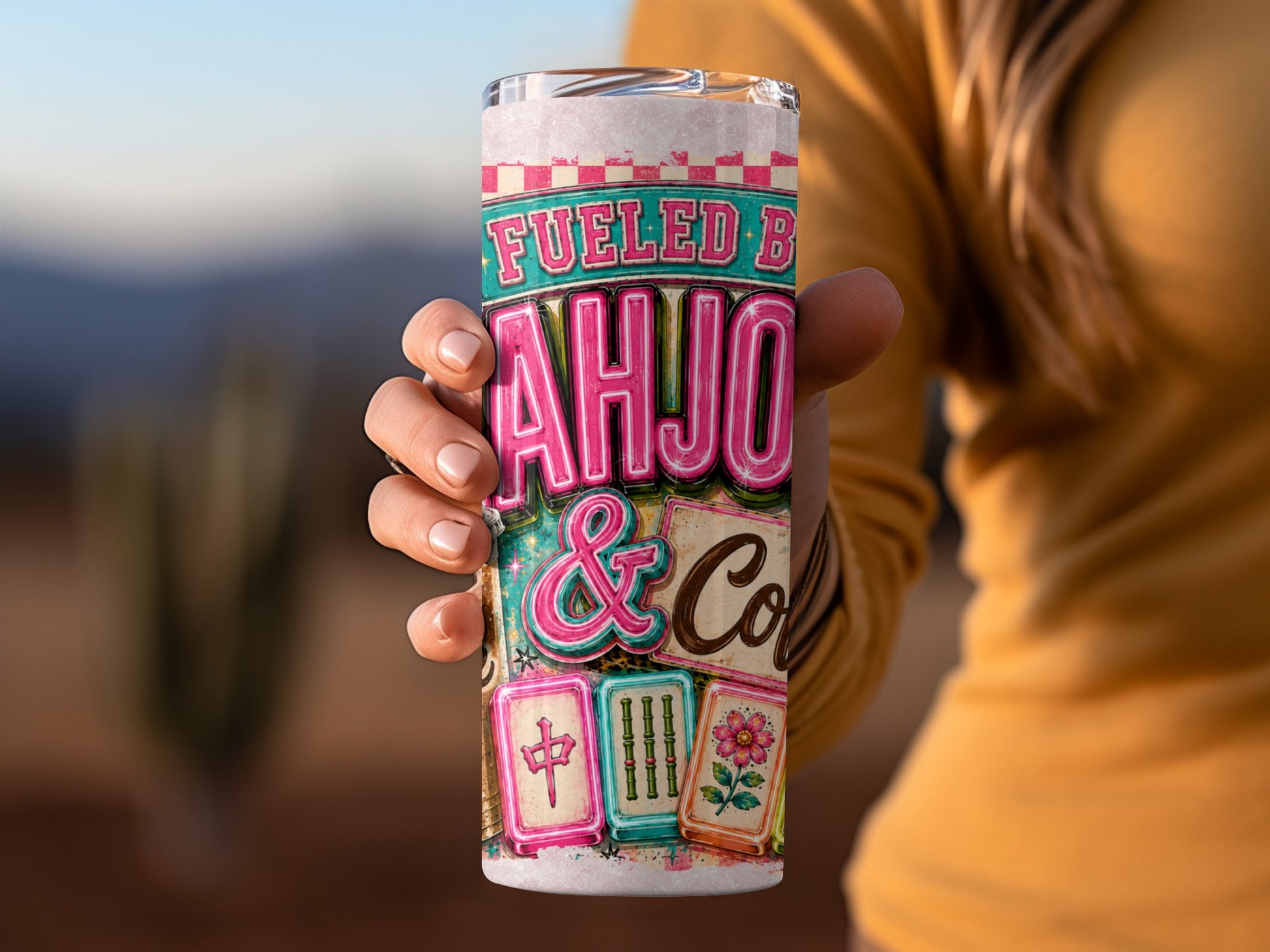 Tumbler with "Fueled By Mahjong & Coffee" text and mahjong tiles.