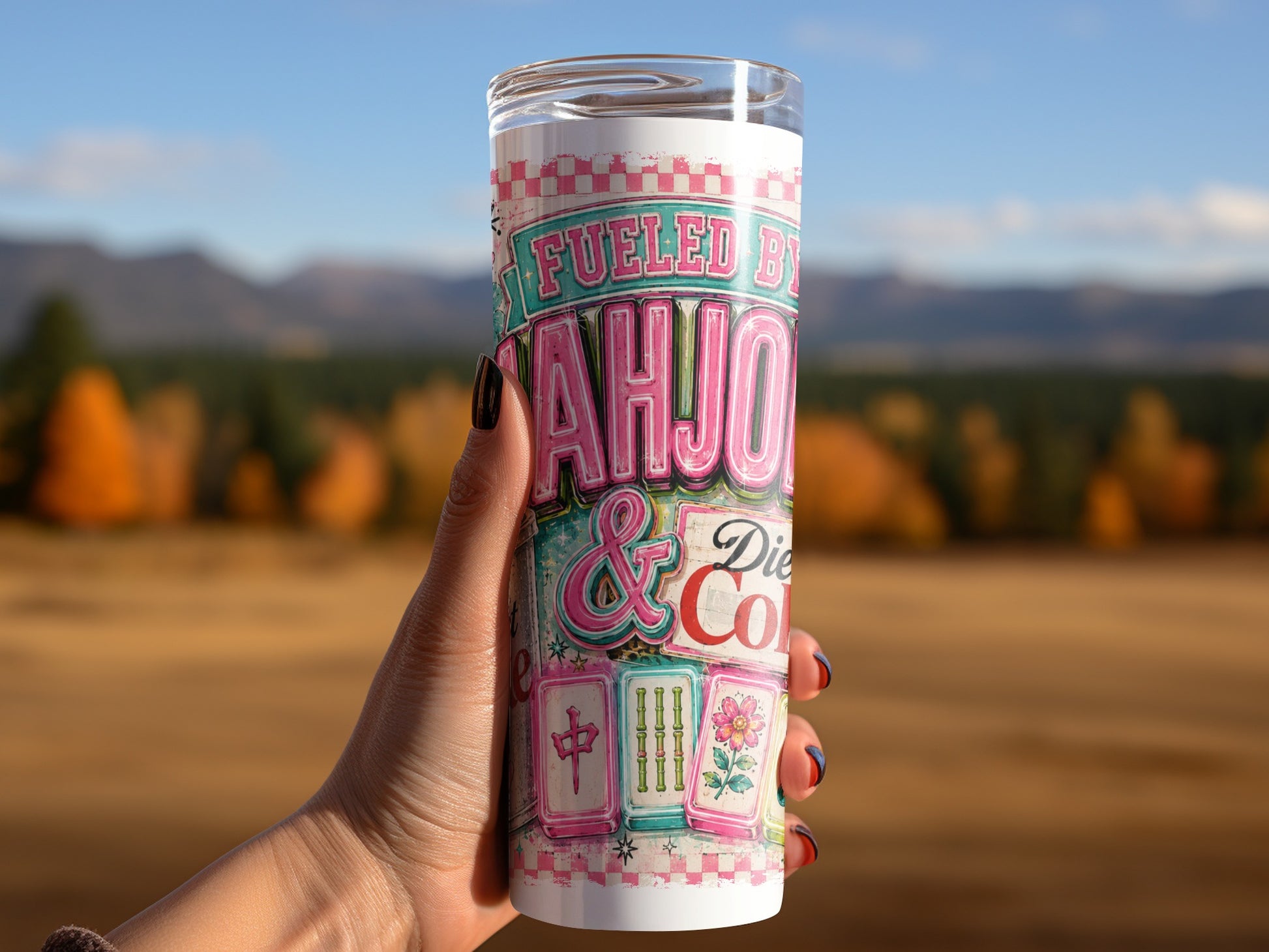 Tumbler with "Fueled by Mahjong & Dice" design, featuring mahjong tiles.