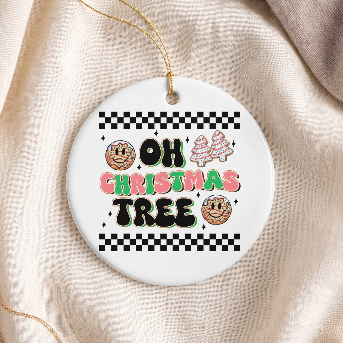 Round Christmas ornament with "Oh Christmas Tree" text, cookies, and trees.