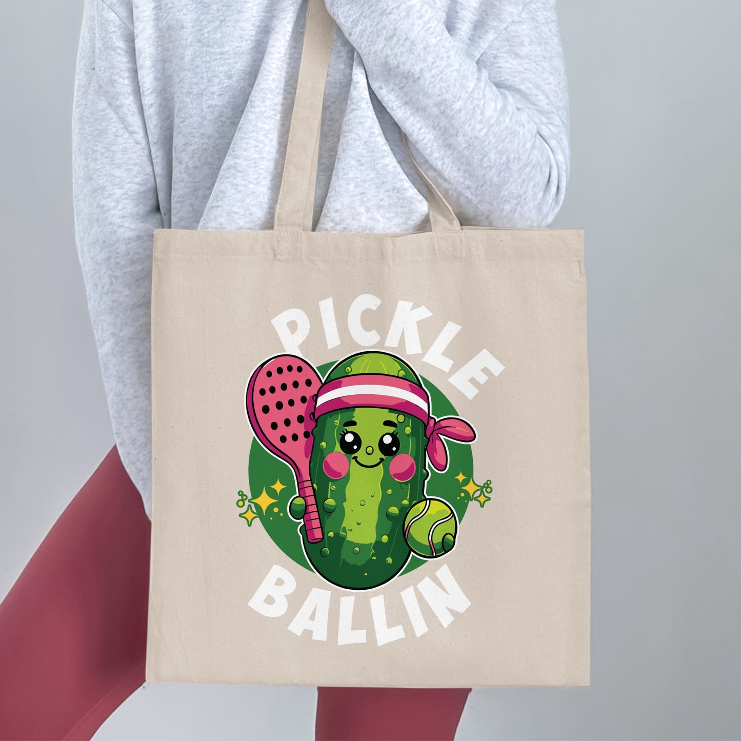 Cute pickle character with pickleball paddle and ball, saying "Pickle Ballin'".