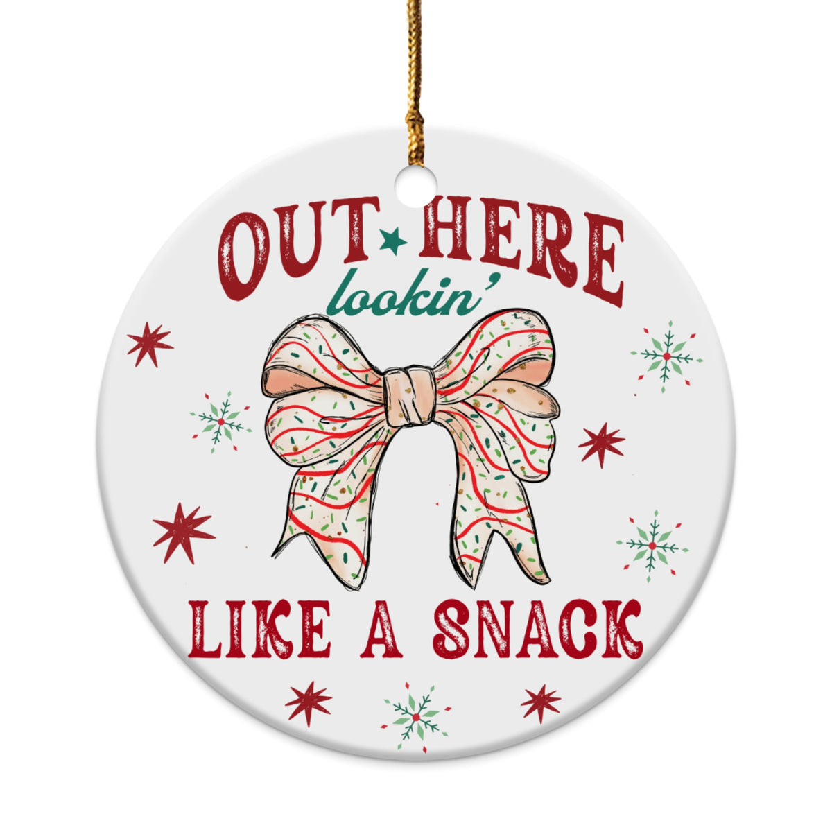 Round ornament with bow graphic and text "OUT HERE lookin LIKE A SNACK".