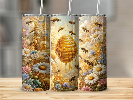 Three tumblers with honeycombs, bees, and daisies.