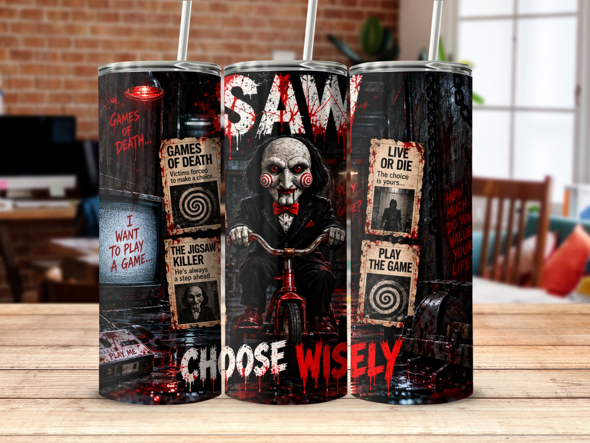 Three stainless steel tumblers feature horror-themed artwork from the movie Saw, showing the Billy puppet on a tricycle with bloody text.