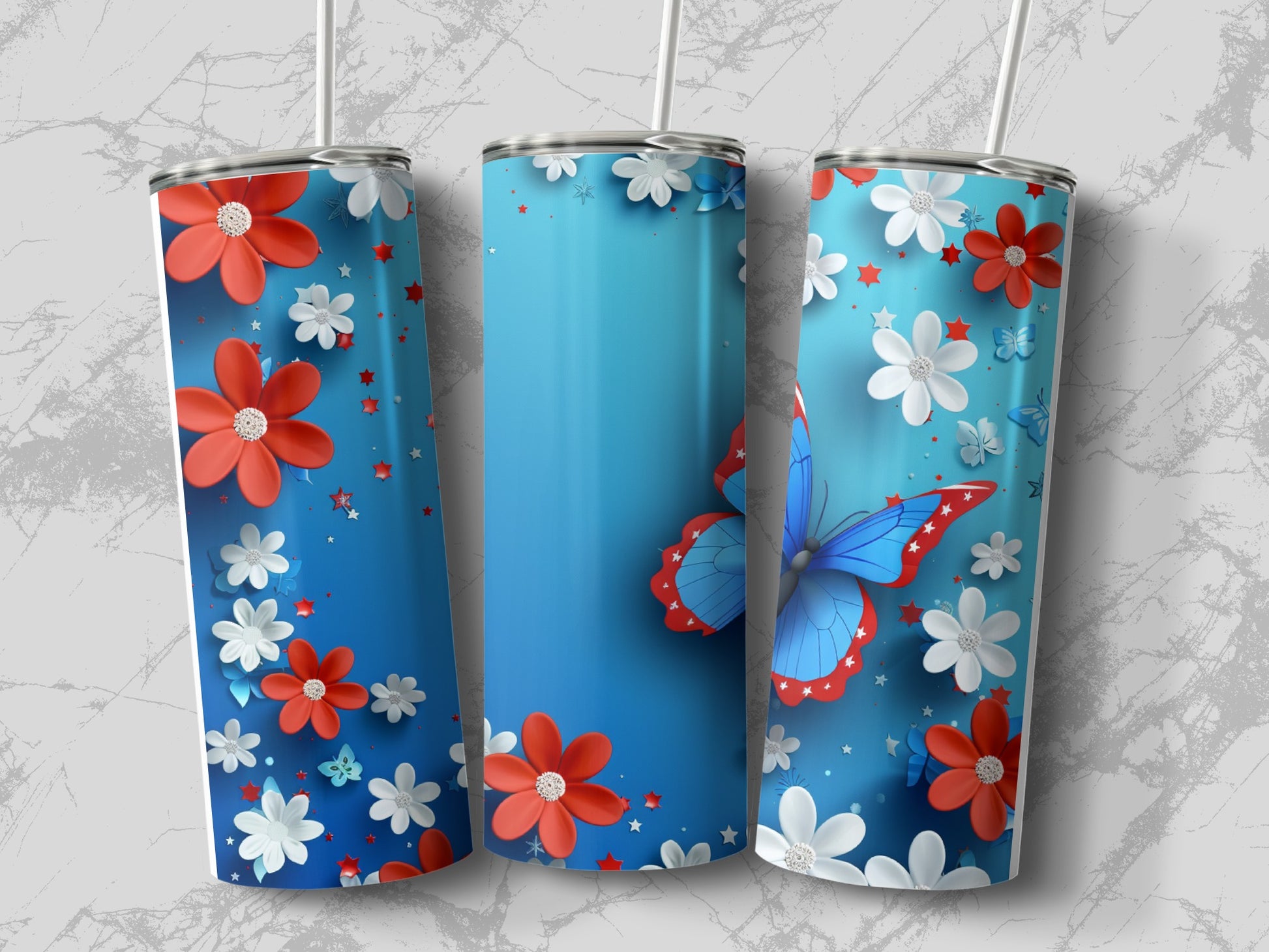 Three blue tumblers with red and white flowers and butterflies.