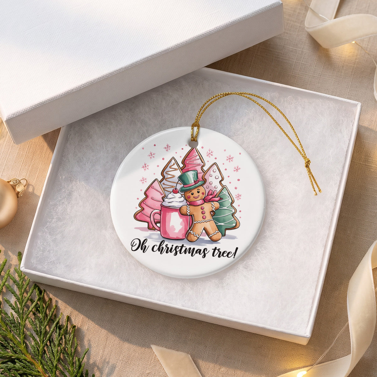 Ceramic ornament with gingerbread man, mug, and Christmas trees, says "Oh Christmas tree!".