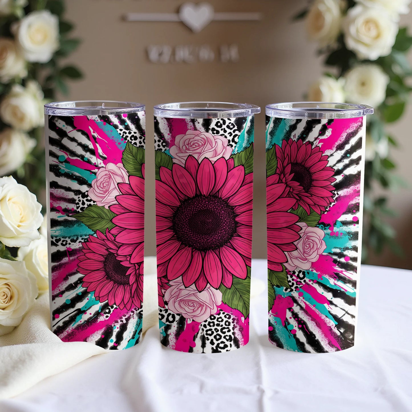 Three tumblers featuring sunflowers, zebra print, leopard print, and pink splatters.