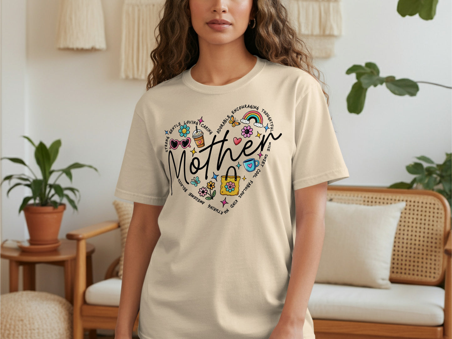 Cream t-shirt with heart graphic listing motherly qualities and "Mother" text.
