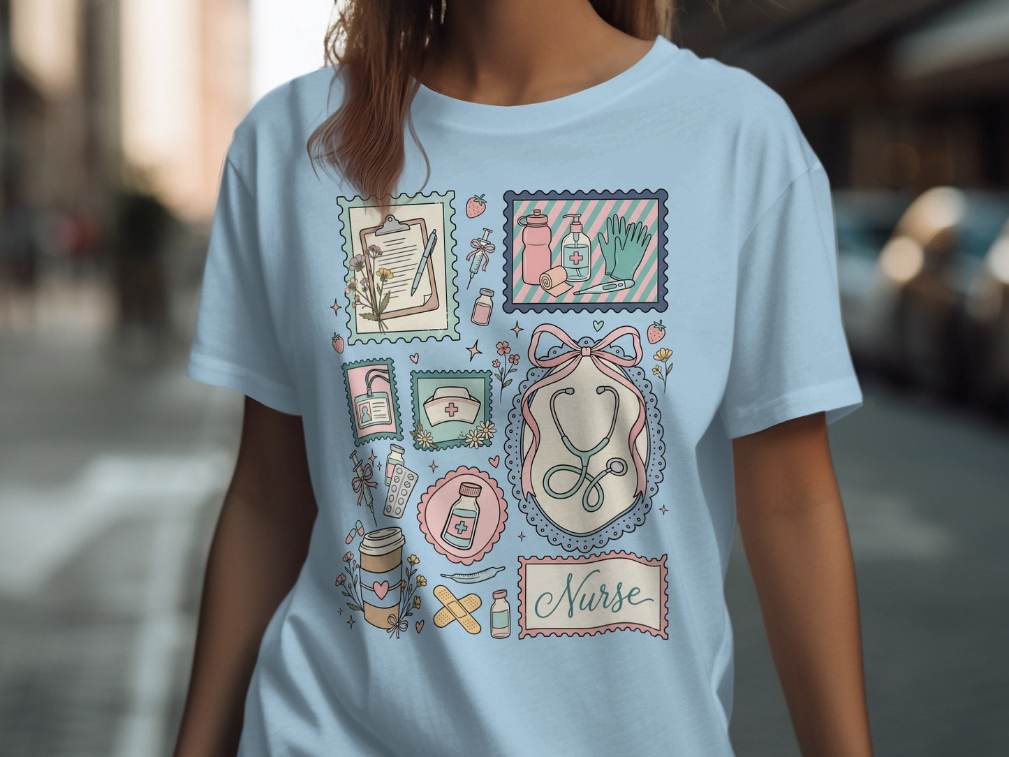 Light blue t-shirt with a collage of medical and nursing-themed illustrations.