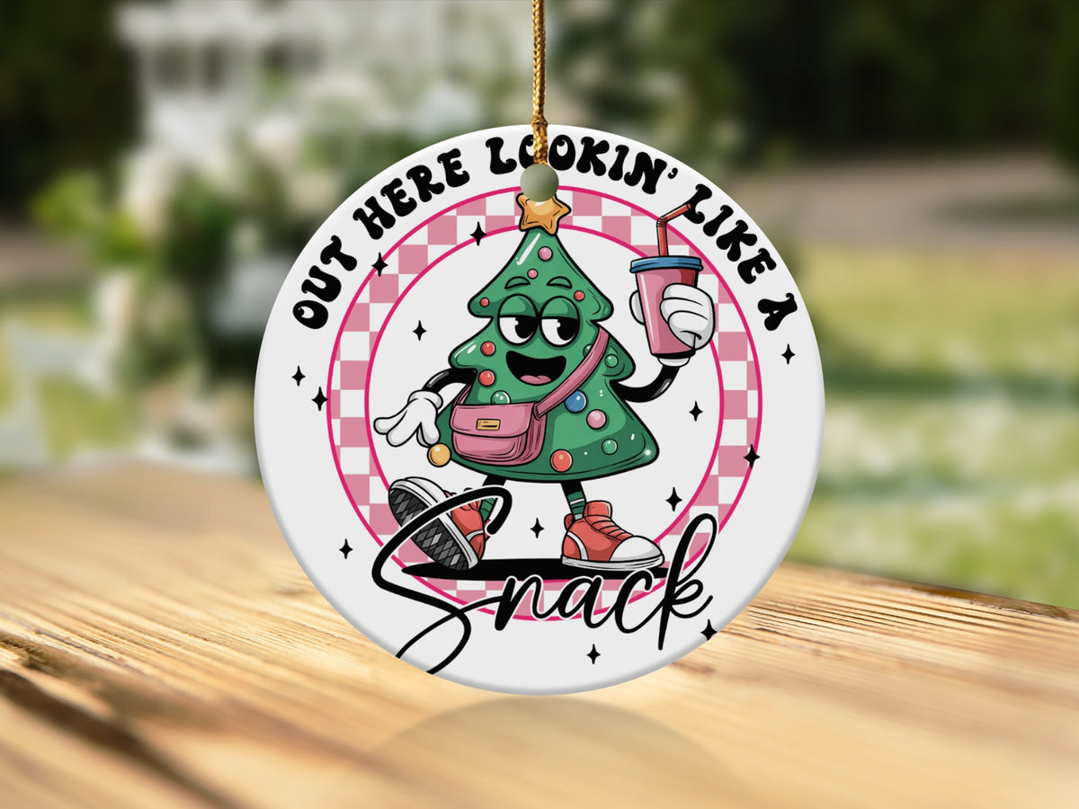 Christmas tree ornament with text "Out here lookin' like a snack".