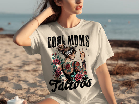 T-shirt with "Cool Moms Have Tattoos" and floral rose design.