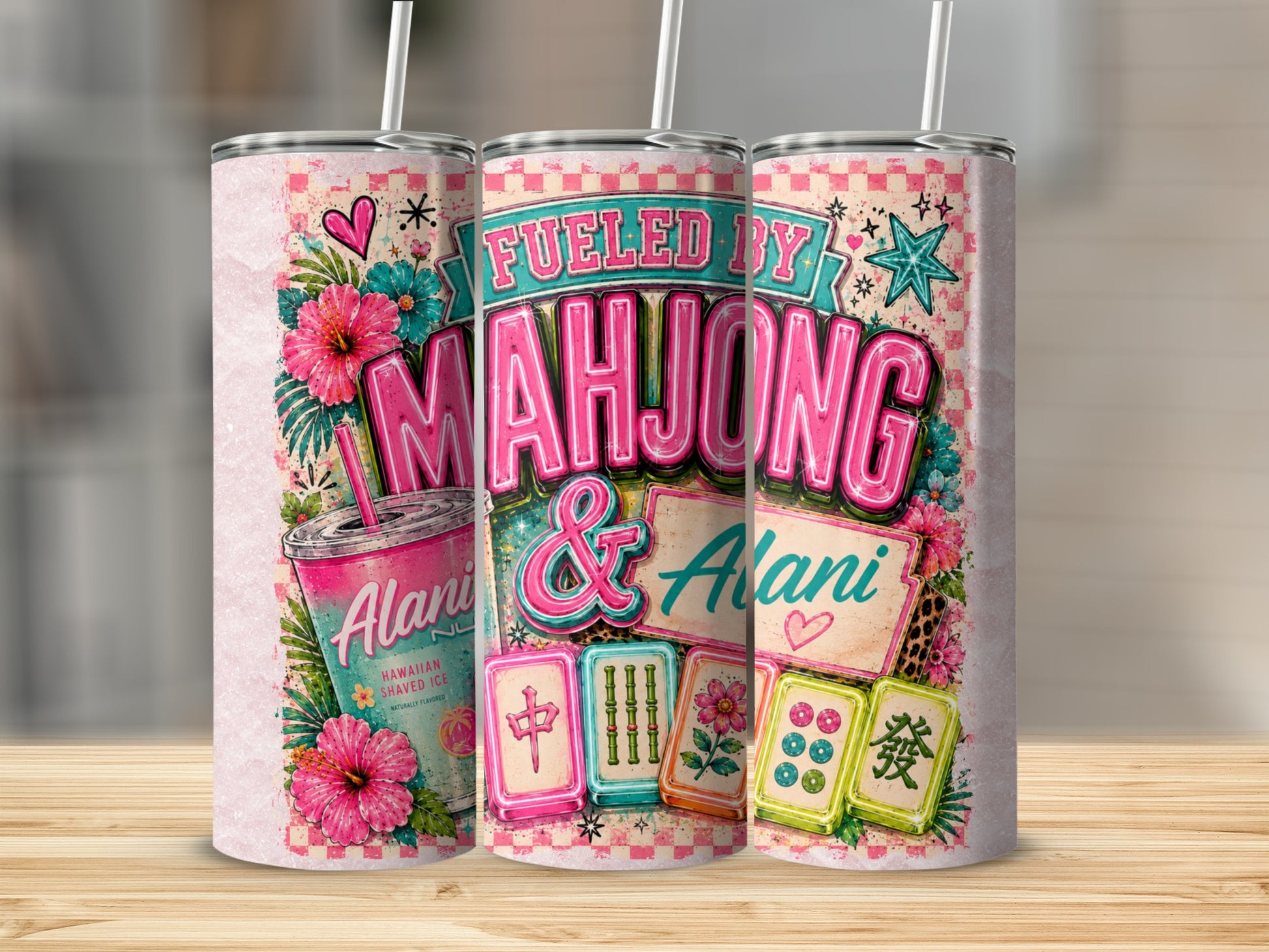 Pink and teal tumbler with "Fueled by Mahjong & Alani" and Mahjong tiles.