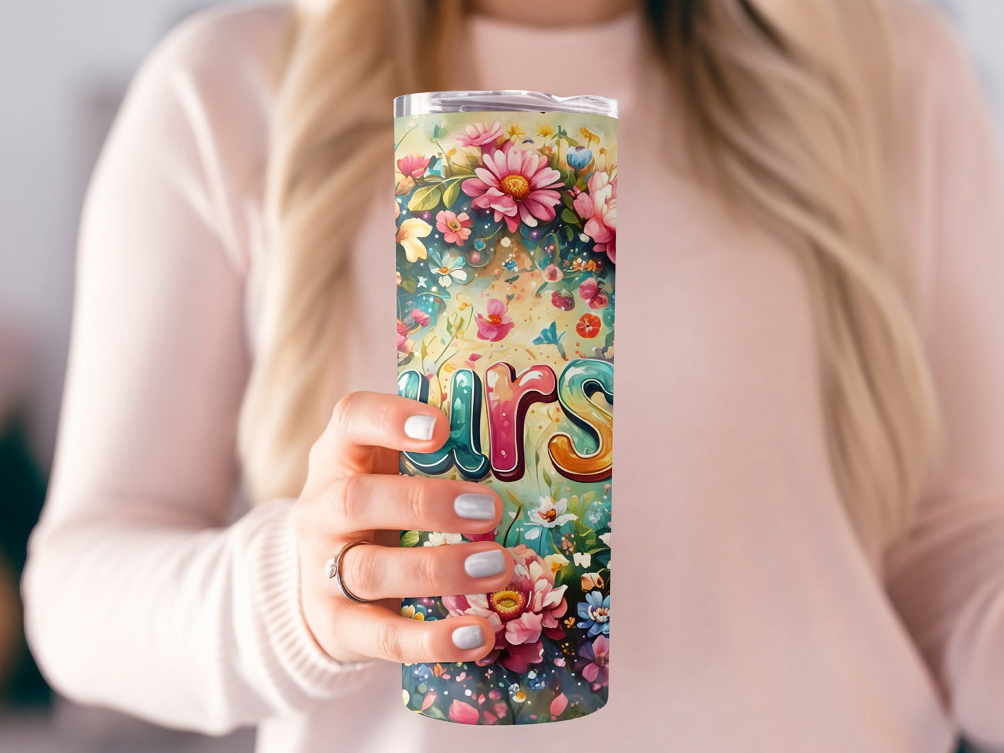 Floral tumbler with "ours" text in colorful, bubbly font.